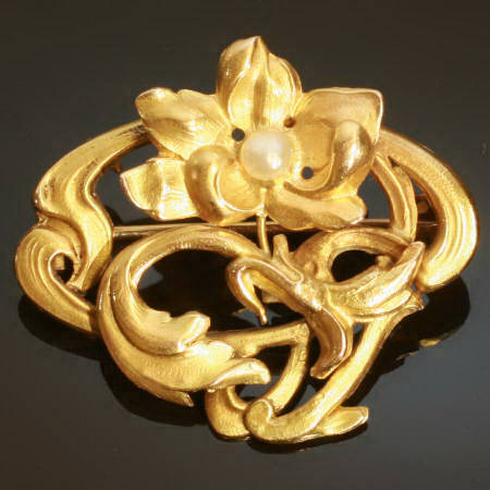 Golden French strong stylistic Art Nouveau brooch